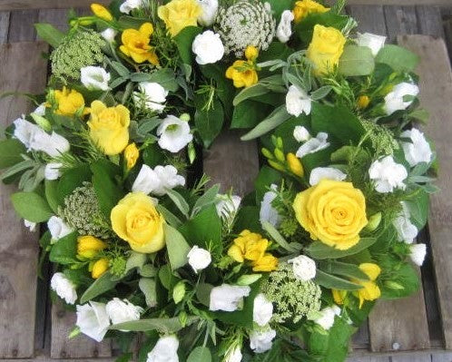 Yellow country style funeral wreath